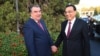 Tajik President Emomali Rahmon (left) greets Chinese Prime Minister Li Keqiang in Dushanbe late last year. 