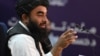 Taliban spokesman Zabihullah Mujahid speaks during a press conference in Kabul on September 6.