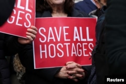 Supporters and relatives of hostages held in Gaza gather in front of the White House prior to Netanyahu's meeting with Trump on February 4