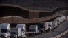 Trucks line up at the Mexican border before crossing into the United States near San Diego.