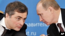 Russia’s search for a national idea is over, Vladislav Surkov (left) suggests: The idea is Vladimir Putin.