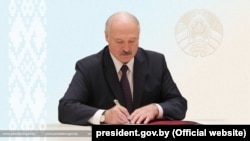 Belarusian leader Alyaksandr Lukashenka signs a new law severely restricting civil rights and freedom of information amid the crackdown on dissent in May 2021.