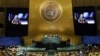 Ukrainian President Volodymyr Zelenskiy is pictured on video screens as he delivers a prerecorded address to the 77th Session of the United Nations General Assembly at UN Headquarters in New York on September 21.