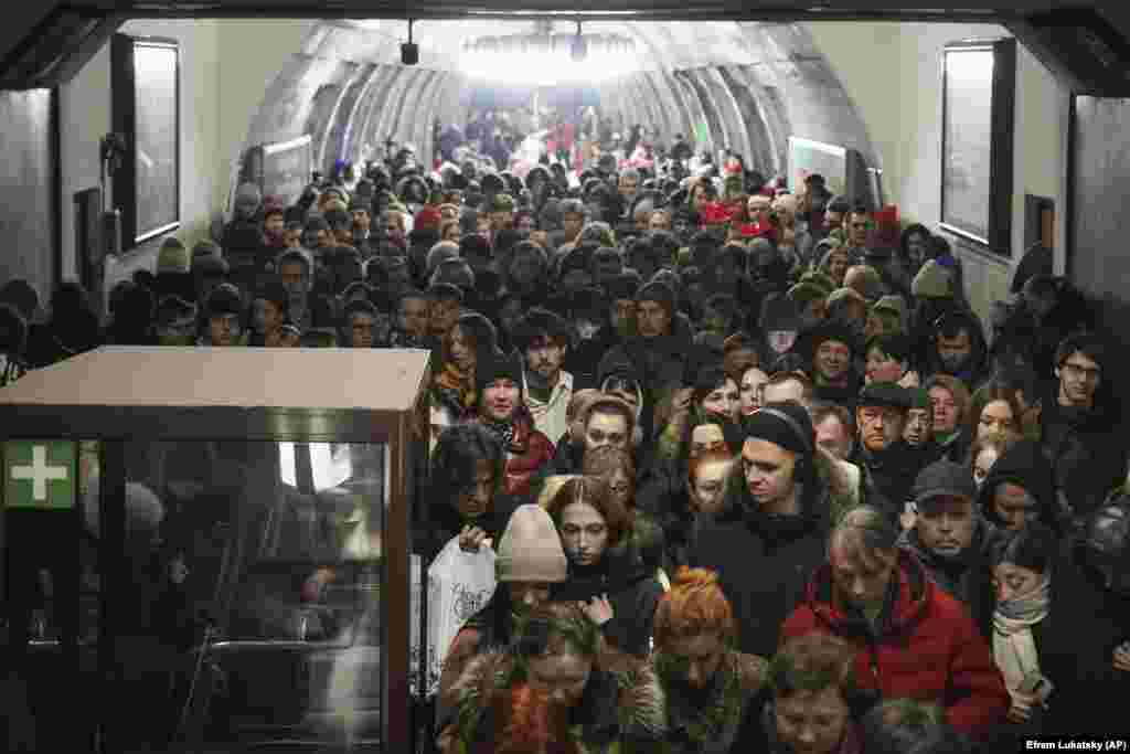 People take shelter in a metro station during an air-raid alert in Kyiv.