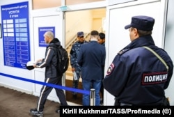 Foreign workers register at a migration service center in Novosibirsk in May.