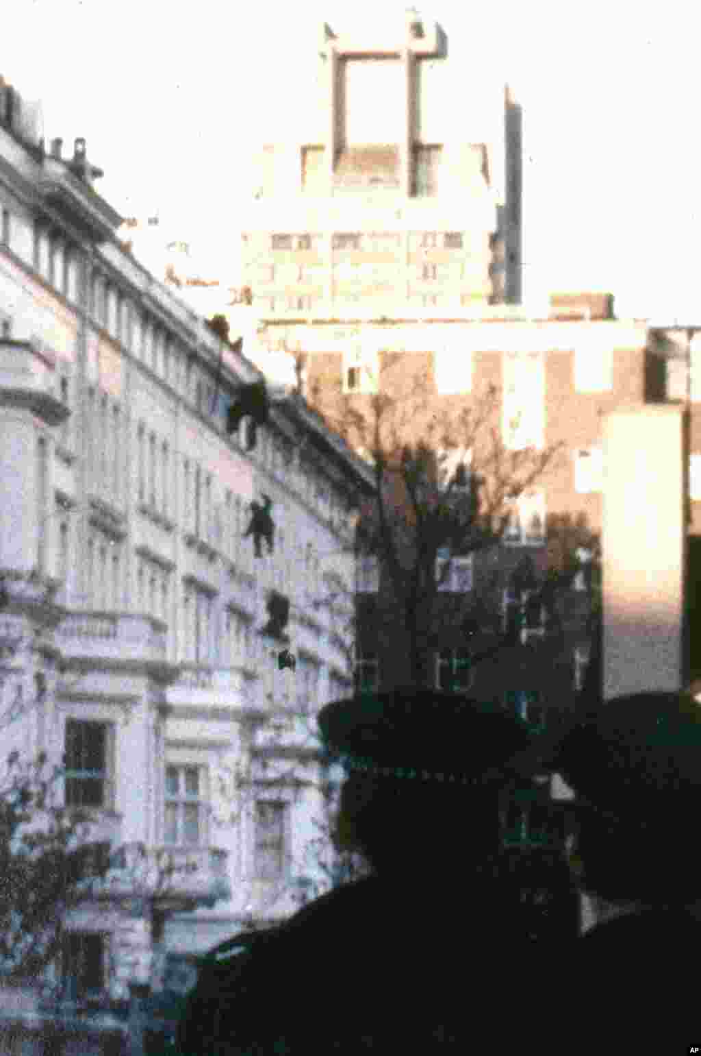 Elite members of Britain&#39;s SAS abseil down the wall at the rear of the embassy on May 5, 1980, to end the six-day siege.