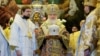 Bishop Flavian (left) attends a ceremony with Patriarch Kirill in 2014.