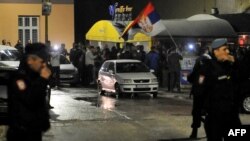 Election night in Srebrenica was tense. The two sides gathered on opposite sides of the street as one celebrated -- with a police cordon in between.