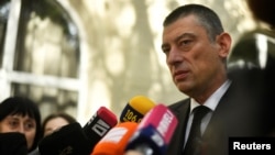 Giorgi Gakharia, the leader of the For Georgia opposition party, speaks to the media after voting at a polling station in Tbilisi on October 26.