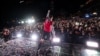 Georgian national team forward Budu Zivzivadze celebrates with fans after the team won the UEFA EURO 2024 qualifying playoff final against Greece in Tbilisi on March 27.