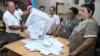 Ballots being counted after Azerbaijan's parliamentary elections on September 1. 