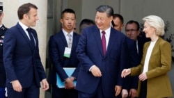 French President Emmanuel Macron (left), Chinese leader Xi Jinping (center), and European Commission President Ursula von der Leyen (right) leave after holding a trilateral talks in Paris in 2024. 