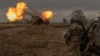 Ukrainian members of the 45th Artillery Brigade fire a Swedish-made Archer Howitzer toward Russian positions in the Donetsk region on January 20.