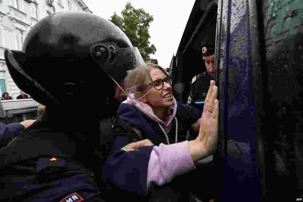 Prominent opposition activist Lyubov Sobol was taken away by police as she left her political headquarters. She is on hunger strike, demanding the right to run in local elections, and a key organizer of the current wave of protests.