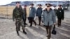 Senior commanders of Russia's Strategic Rocket Forces enter a U.S. intercontinental ballistic missile base in October 1996. 