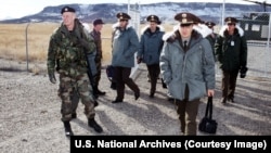 Senior commanders of Russia's Strategic Rocket Forces enter a U.S. intercontinental ballistic missile base in October 1996. 