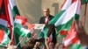 Hungarian Prime Minister Viktor Orban speaks in Budapest's Millenaris Park on October 23 during commemorations of the 1956 anti-Soviet revolt.