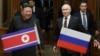 Russian President Vladimir Putin (right) and North Korean leader Kim Jong Un meet at Pyongyang Sunan International Airport outside Pyongyang, North Korea, on June 19.