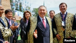 Many in Kazakhstan are worried that that a proposed new pantheon will be used to inter President Nursultan Nazarbaev (center) or other members of the current elite, not Kazakhs whose prominence has been defined by history. 