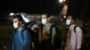 Evacuated Afghans arrive at Tirana International Airport in Albania in August 2021.