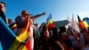 Diana Sosoaca leads a protest against new measures ordered by the Romanian government during the fourth wave of the COVID-19 pandemic in Bucharest on October 2.