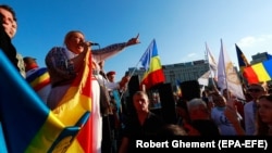 Diana Sosoaca leads a protest against new measures ordered by the Romanian government during the fourth wave of the COVID-19 pandemic in Bucharest on October 2.