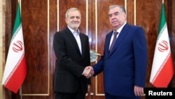 Iranian President Masud Pezeshkian (left) and Tajikistan's President Emomali Rahmon