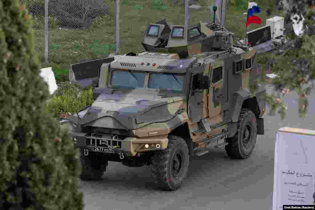 A Russian armored vehicle approaches the Hmeimim base.&nbsp; &quot;It&#39;s interesting to be there without any control, any pressure,&quot; Bektas says. The photographer worked by first speaking to the rebel fighters around the base to alert them to his presence, then he says, &quot;you find a relatively high building, stand there for four hours and take pictures. Something that was impossible is now happening.&quot;