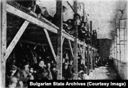 Macedonian Jews in a concentration camp in Skopje photographed before deportation to the Treblinka death camp in Poland.